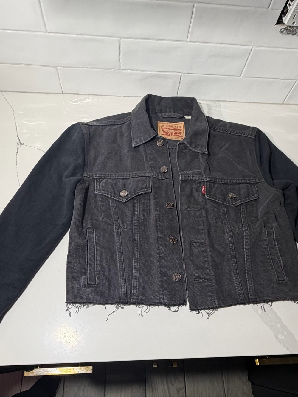 Levi's Women's Black Washed Denim Jacket with Raw Hem